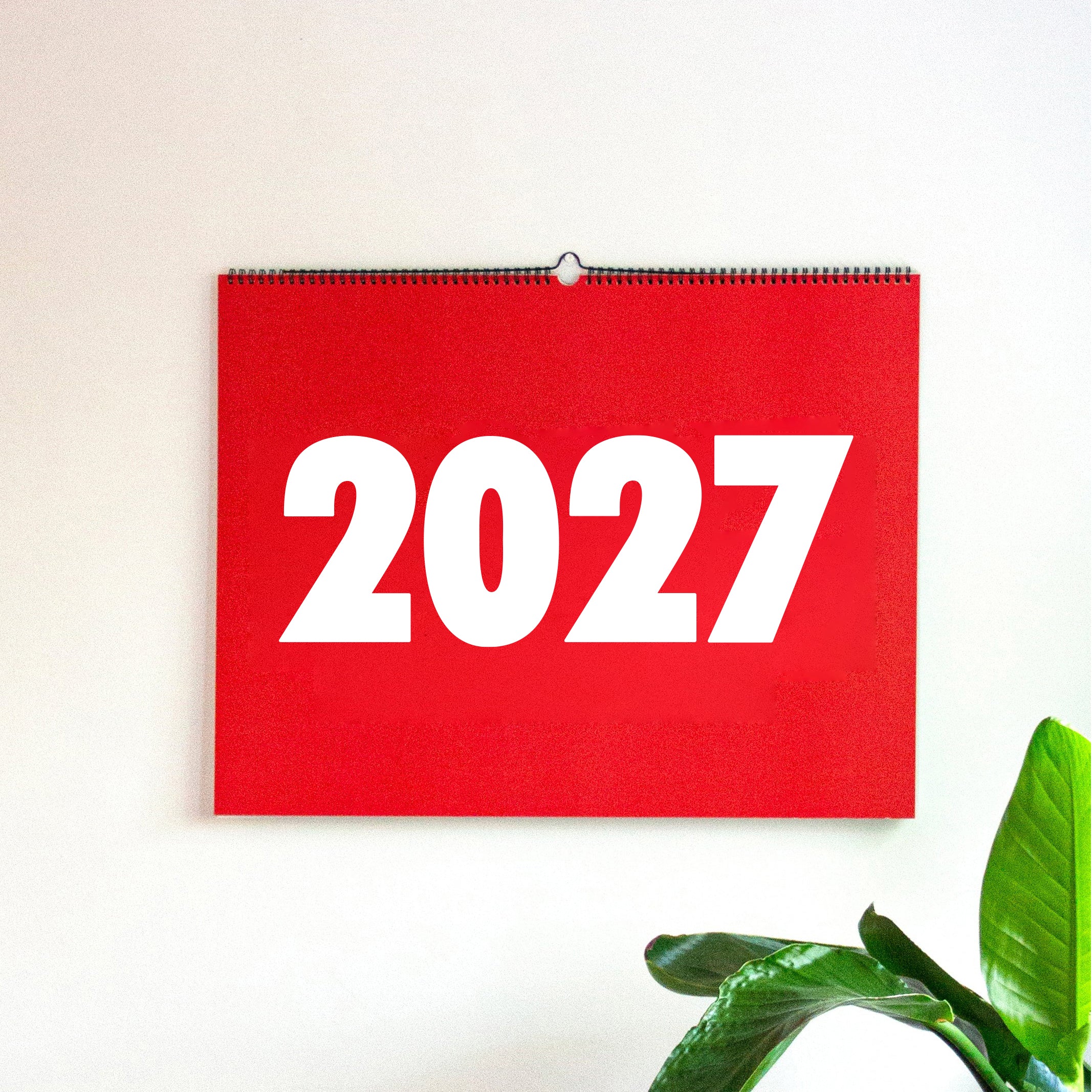 2027 Vinçon wall Calendar by Octàgon Design. The Vinçon calendar hanging on a wall.
