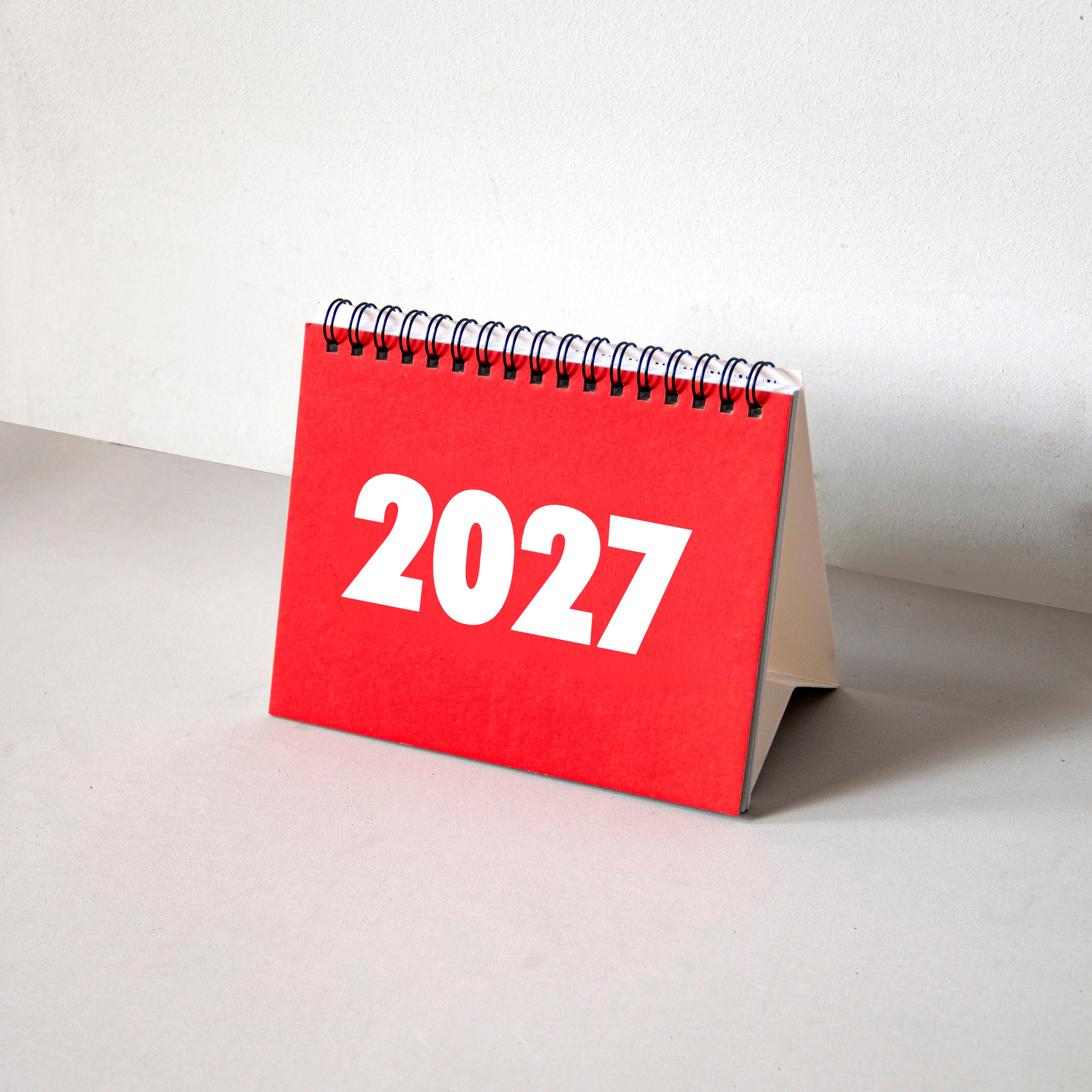 2027 Vinçon desk calendar by Octàgon Design. The calendar on a table.