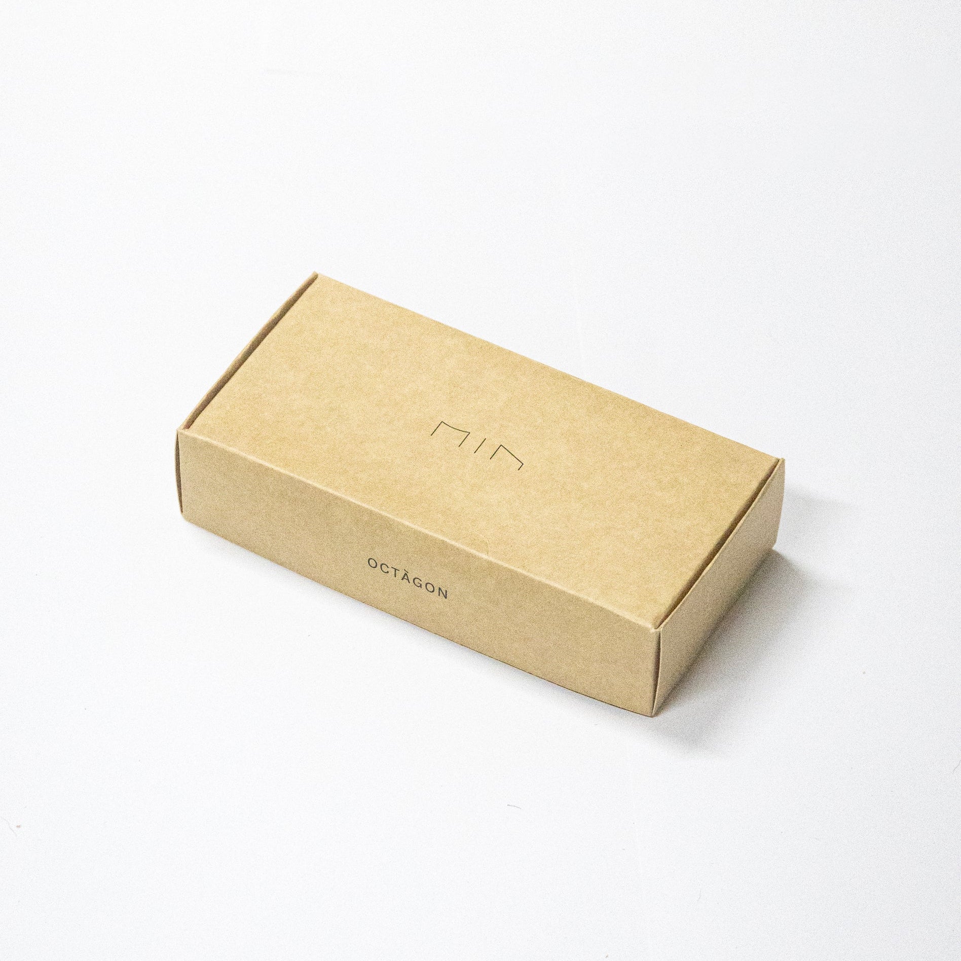 Kraft packaging box of the Min Prism Pencil Holder. 