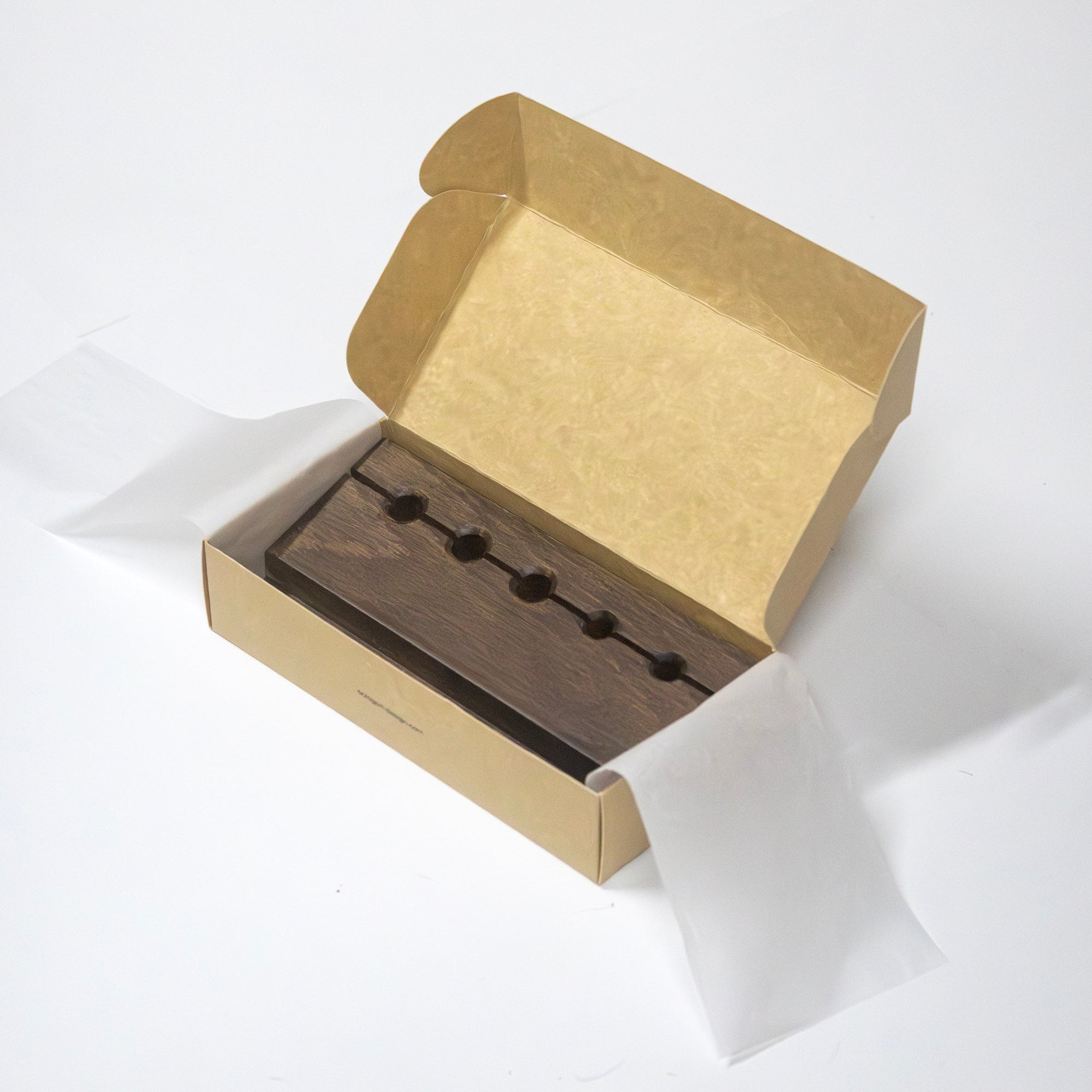 Kraft packaging box with the Min Prism Pencil Holder. 