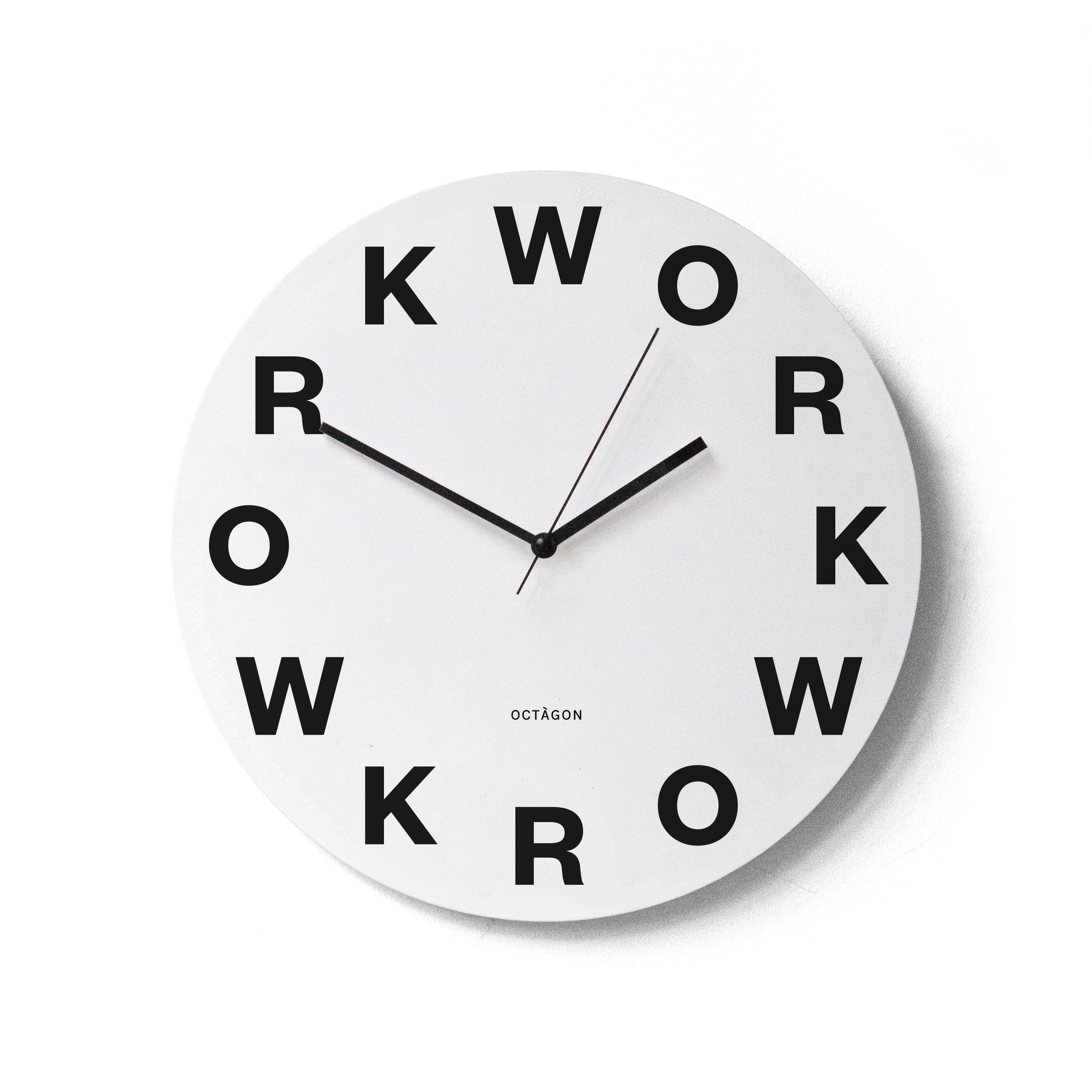 "Work" clock on a white wall | Reloj "Work" en una pared blanca. | Rellotge "Work" en una paret blanca.