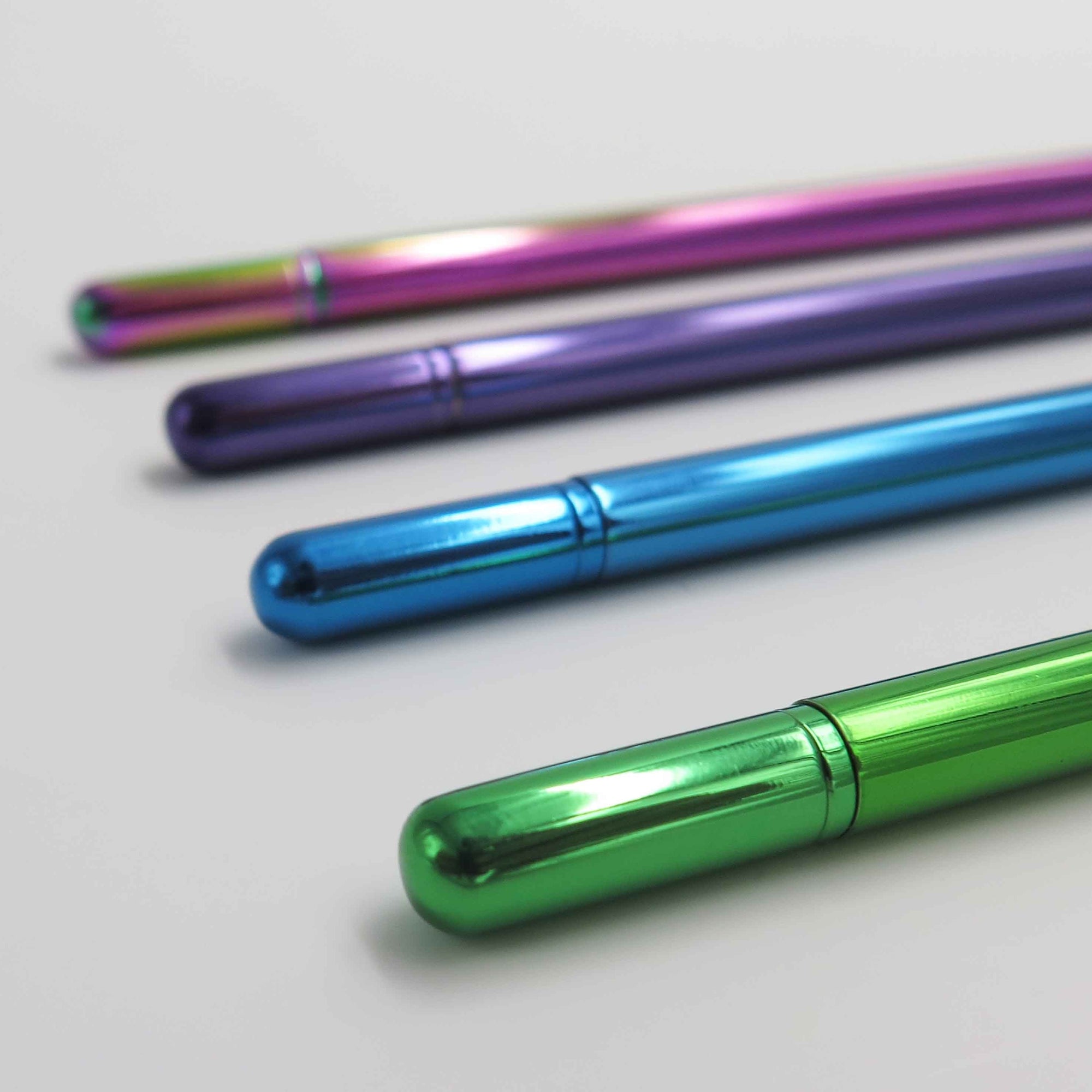 OCTÀGON DESIGN | &quot;Drop pen&quot; collection. Blue, purple, green and rainbow pen colors.