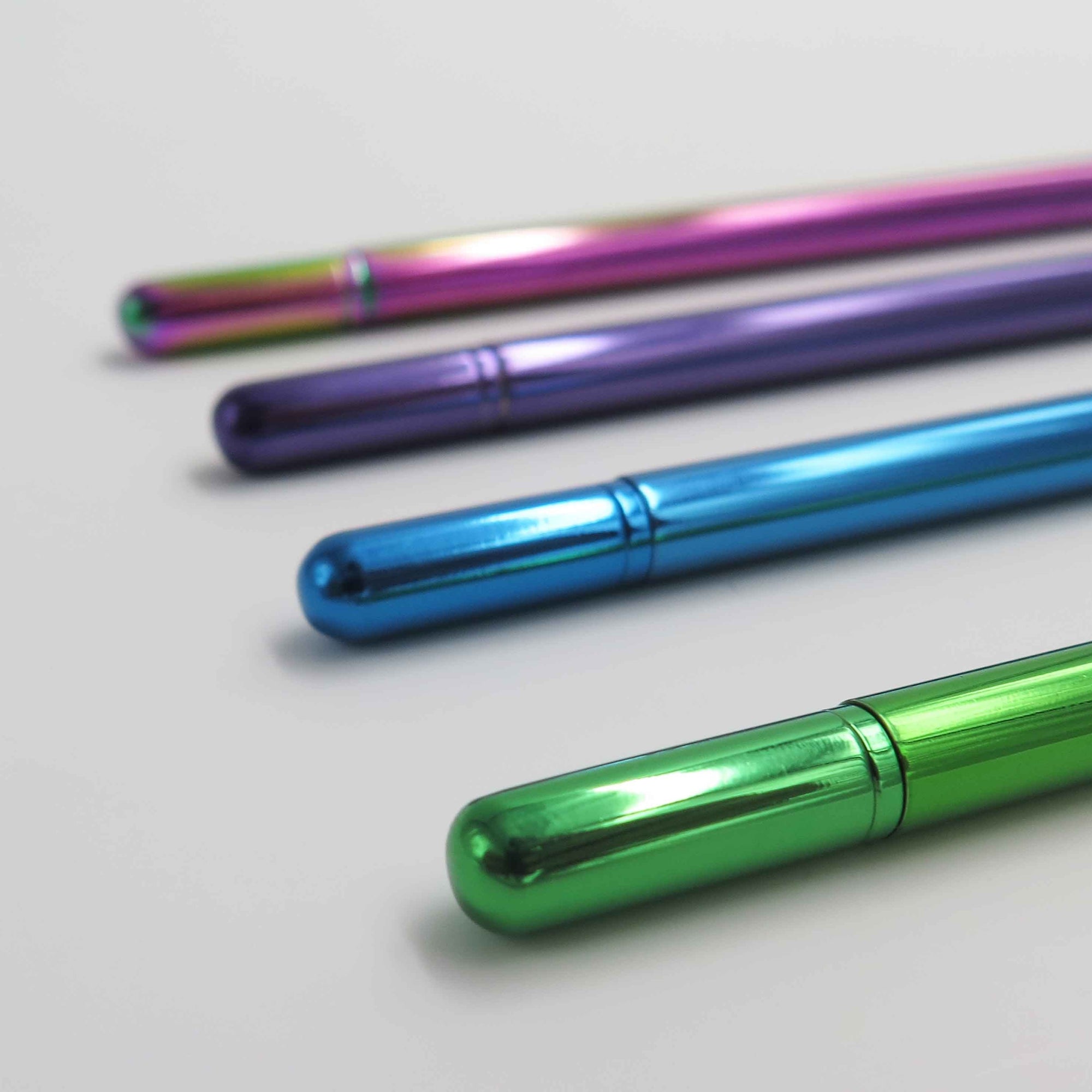 OCTÀGON DESIGN | "Drop pen" collection. Blue, purple, green and rainbow pen colors.