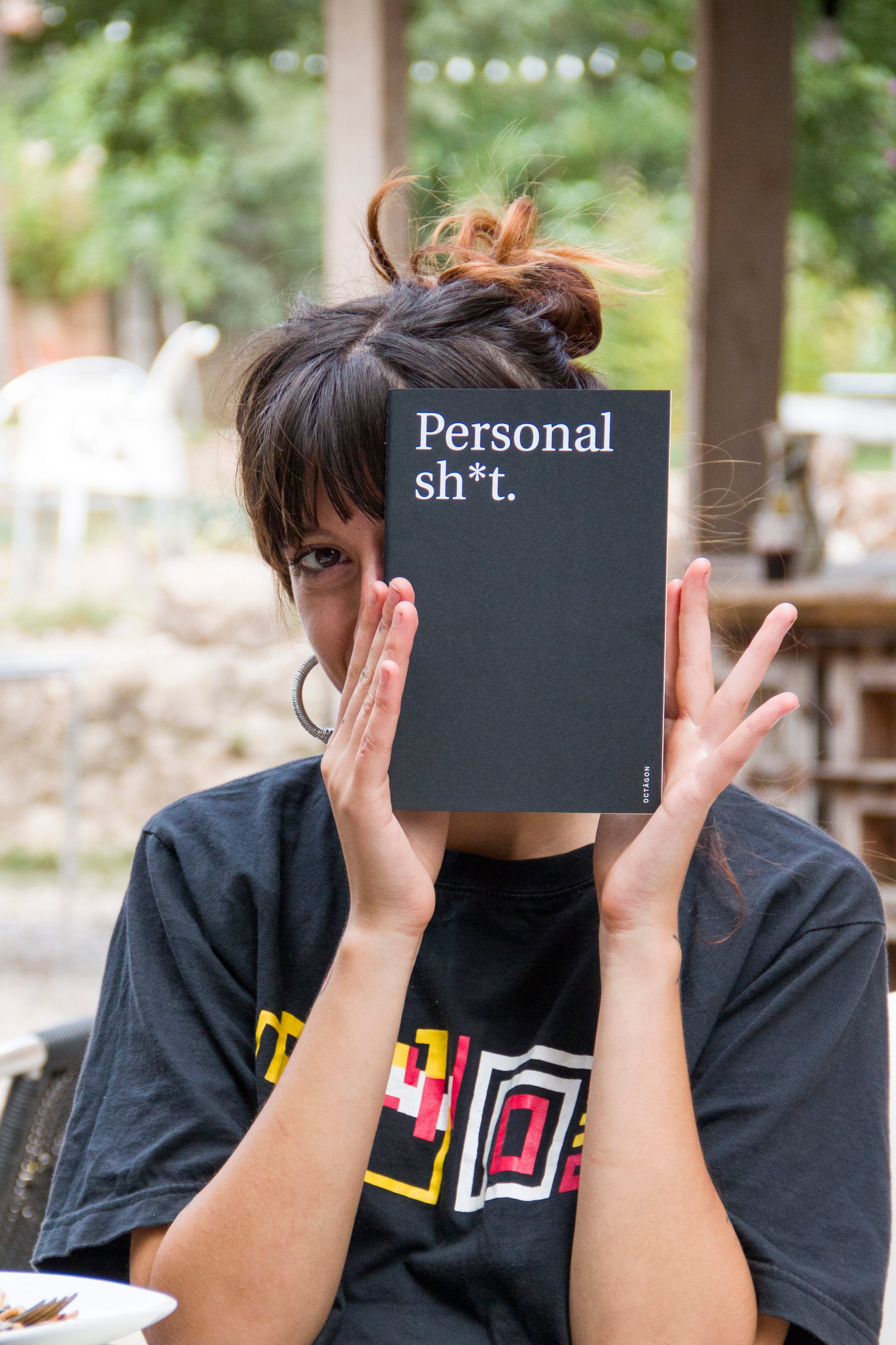 "Personal sh*t" thin notebook. Cover black color and white typography.