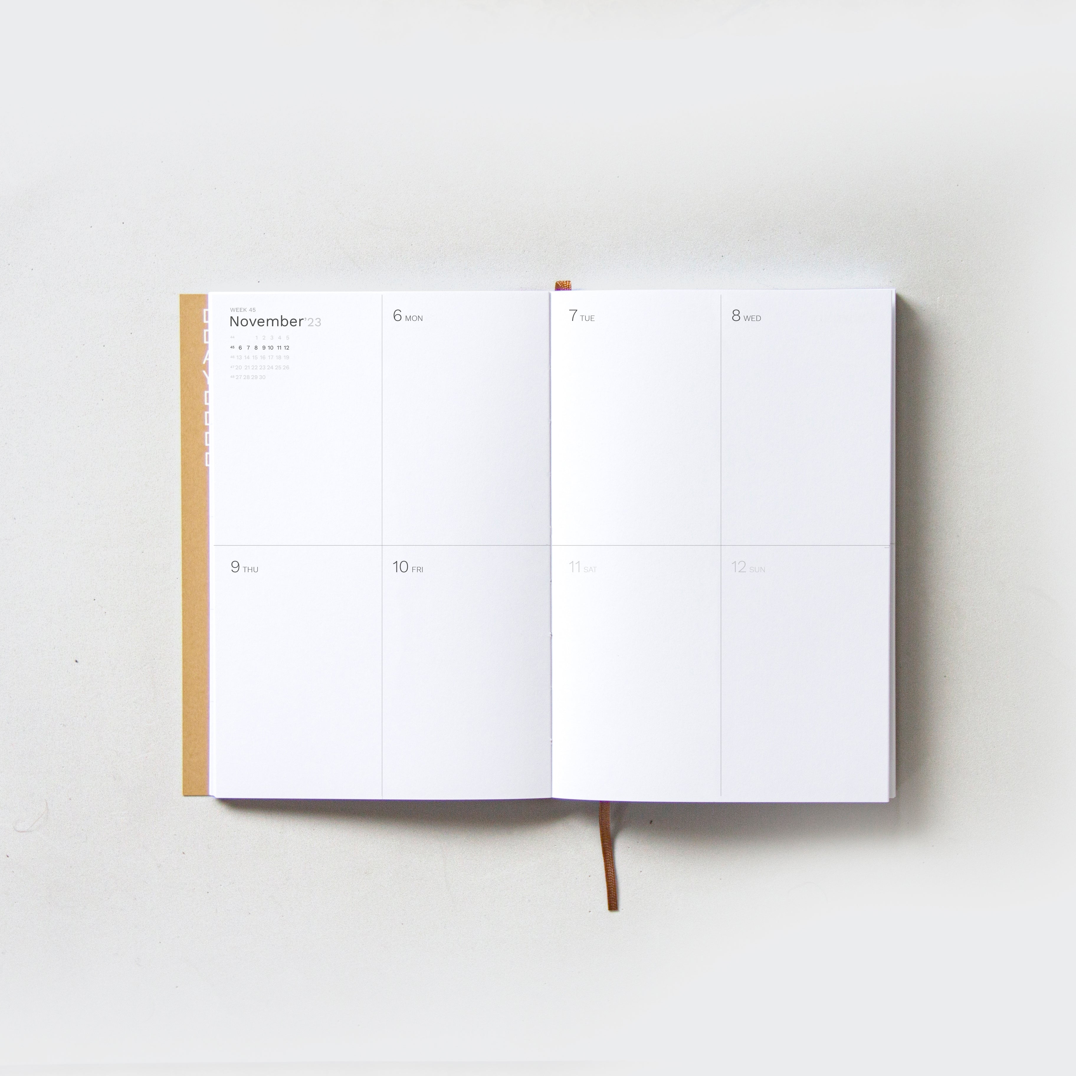OCTÀGON DESIGN, Open "Sep23 to Aug24" Academic weekly planner. Weekly template displayed in two sheets.