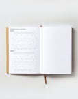OCTÀGON DESIGN, Open "Sep23 to Aug24" Academic weekly planner. International holidays 2023 and 2024 on the left page and a lined template for notes on the right page.
