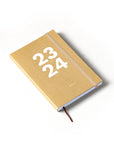 OCTÀGON DESIGN, Sep23 to Aug24 Academic weekly planner, kraft color, white typography with an elastic closure band.