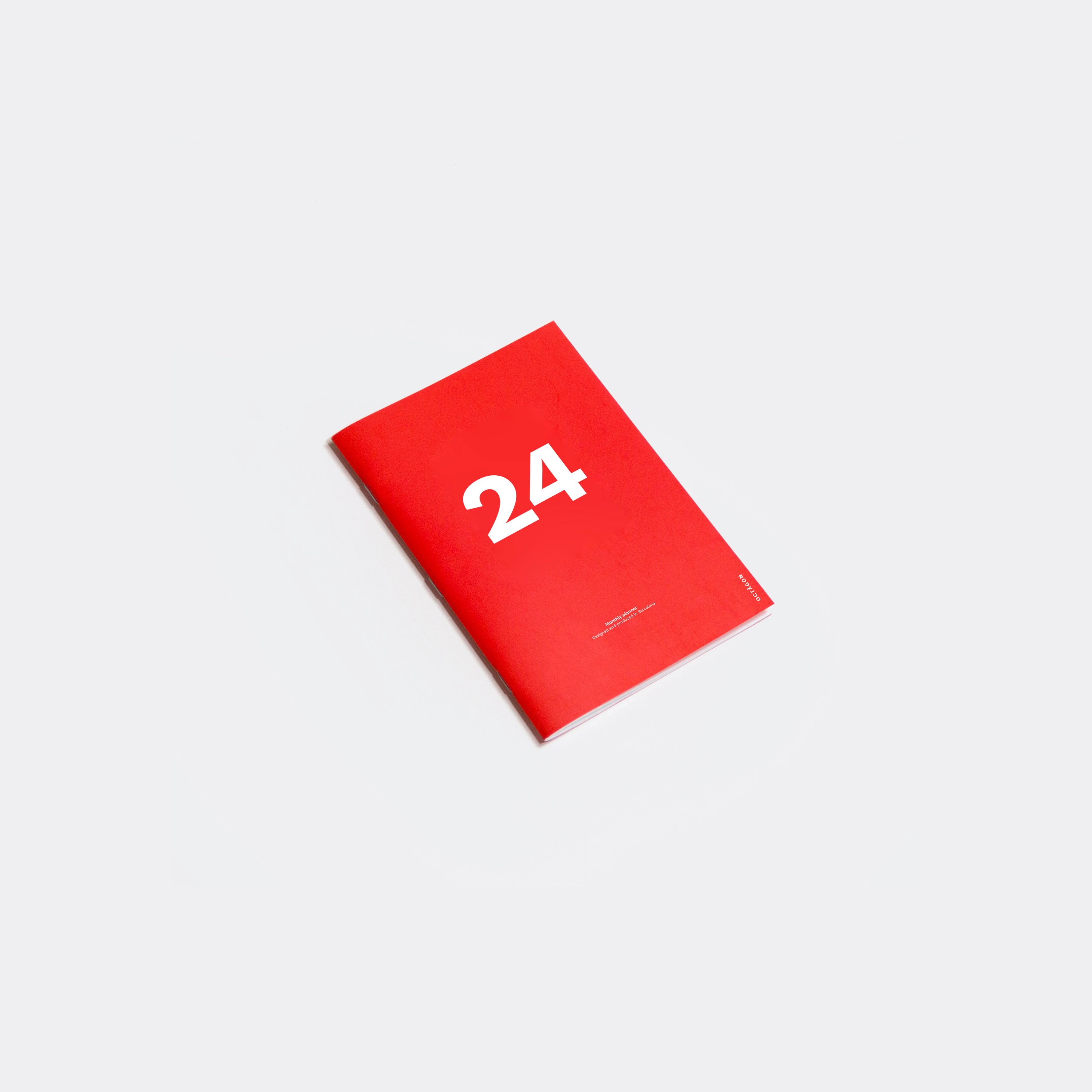 OCTÀGON DESIGN | "2024 Monthly Planner Similar A6 size" monthly planner, red color, white typography.