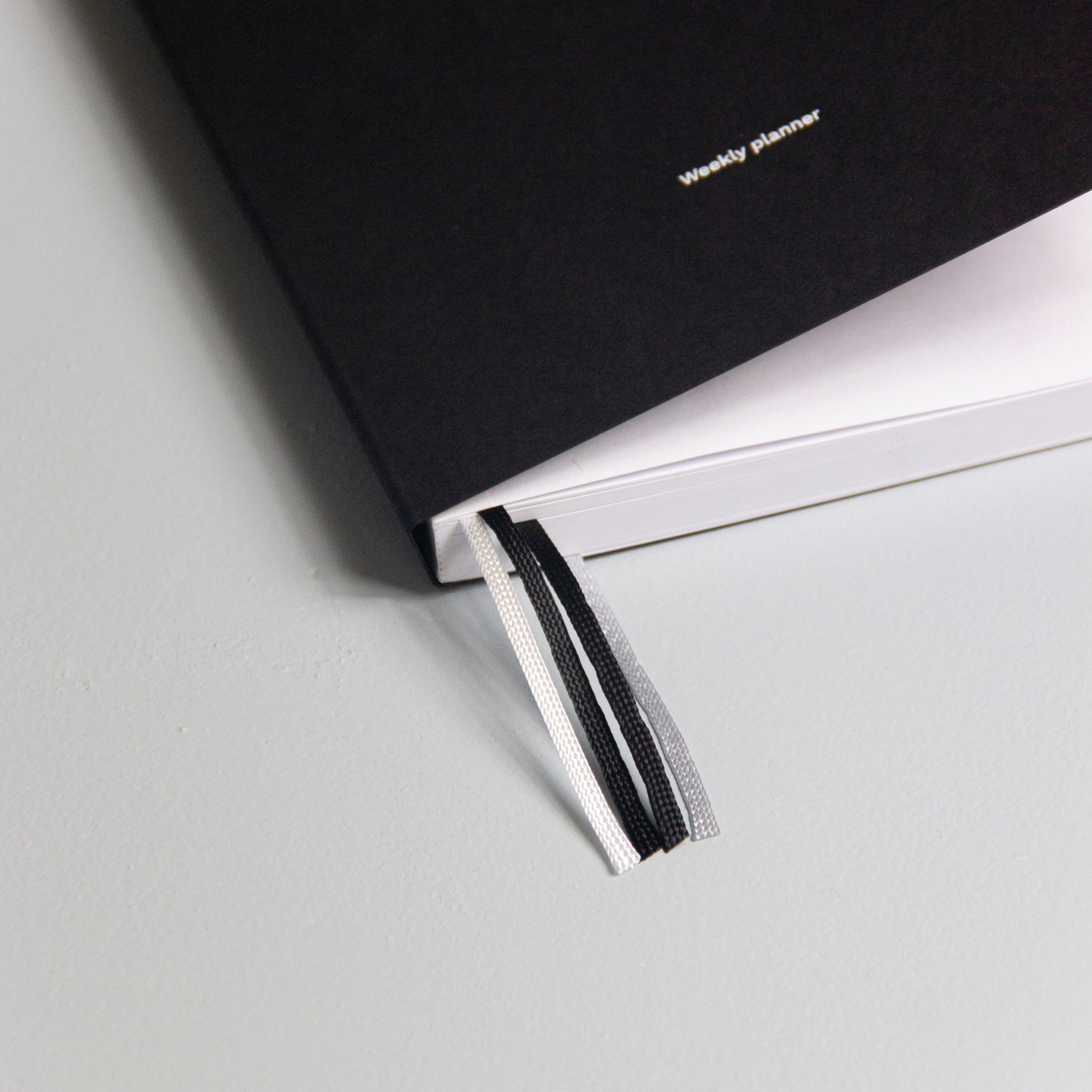 OCTÀGON DESIGN | Black Ribbon Bookmark | 3 ribbons | White, grey and black ribbon bookmarks.| Details