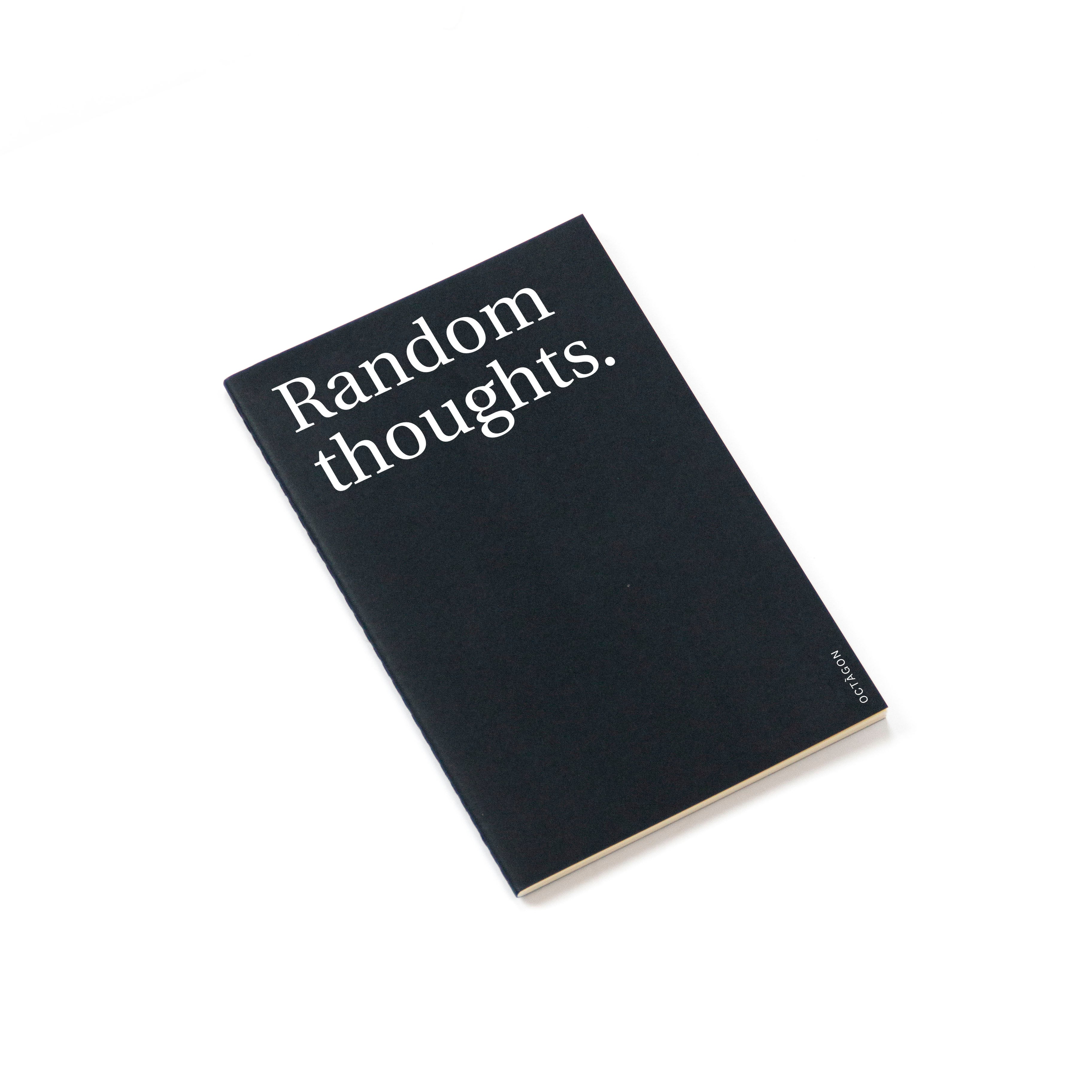 "Random thoughts" thin notebook. Cover black color and white typography.