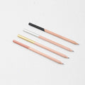 OCTÀGON DESIGN | Set of four wooden pencils copper, black, gold and silver color.